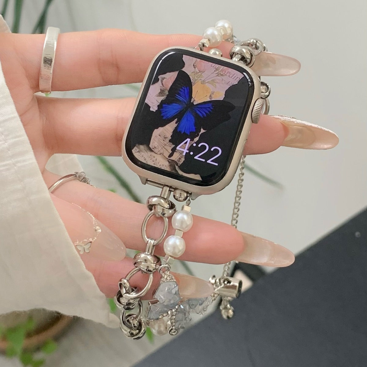 Bracelet Apple Watch avec chaîne papillon en cristal