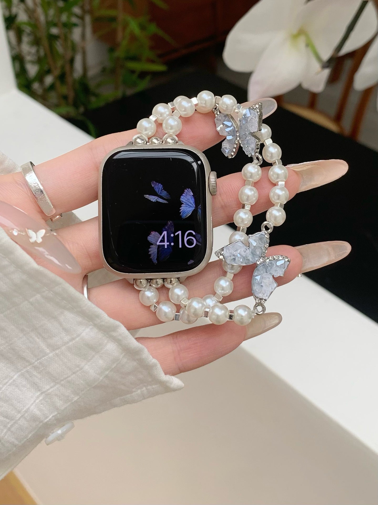 Bracelet Apple Watch avec chaîne papillon en cristal