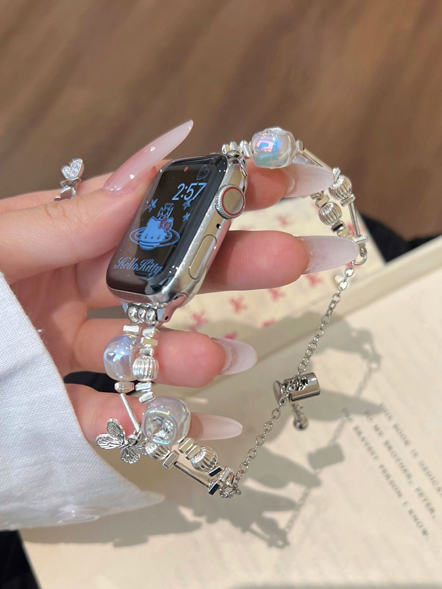 Bracelet Apple Watch avec fermeture éclair en métal et papillon en forme de cœur et de diamants