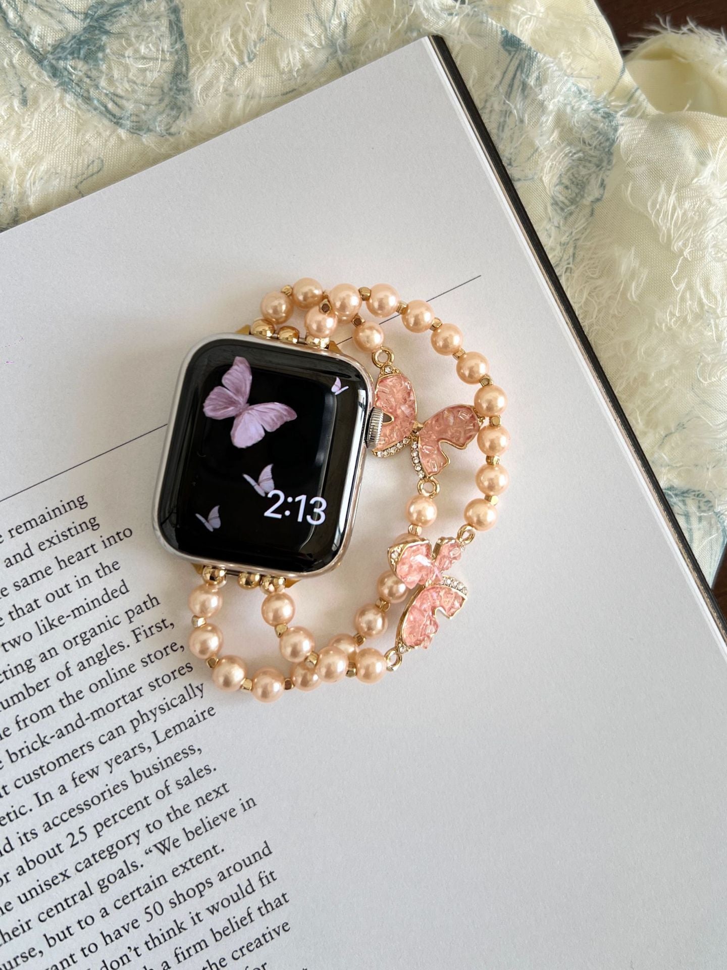 Bracelet Apple Watch avec chaîne papillon en cristal