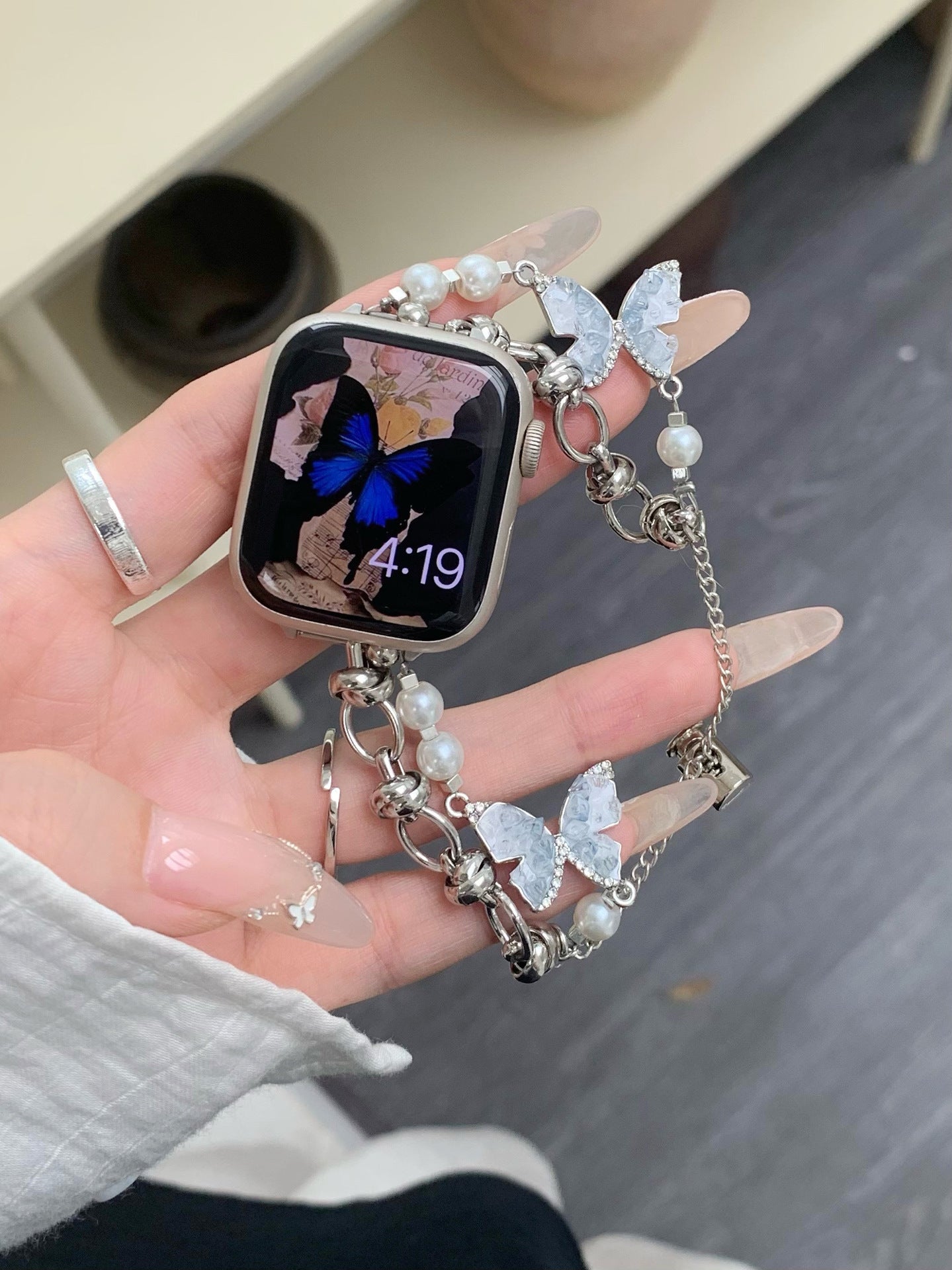 Bracelet Apple Watch avec chaîne papillon en cristal