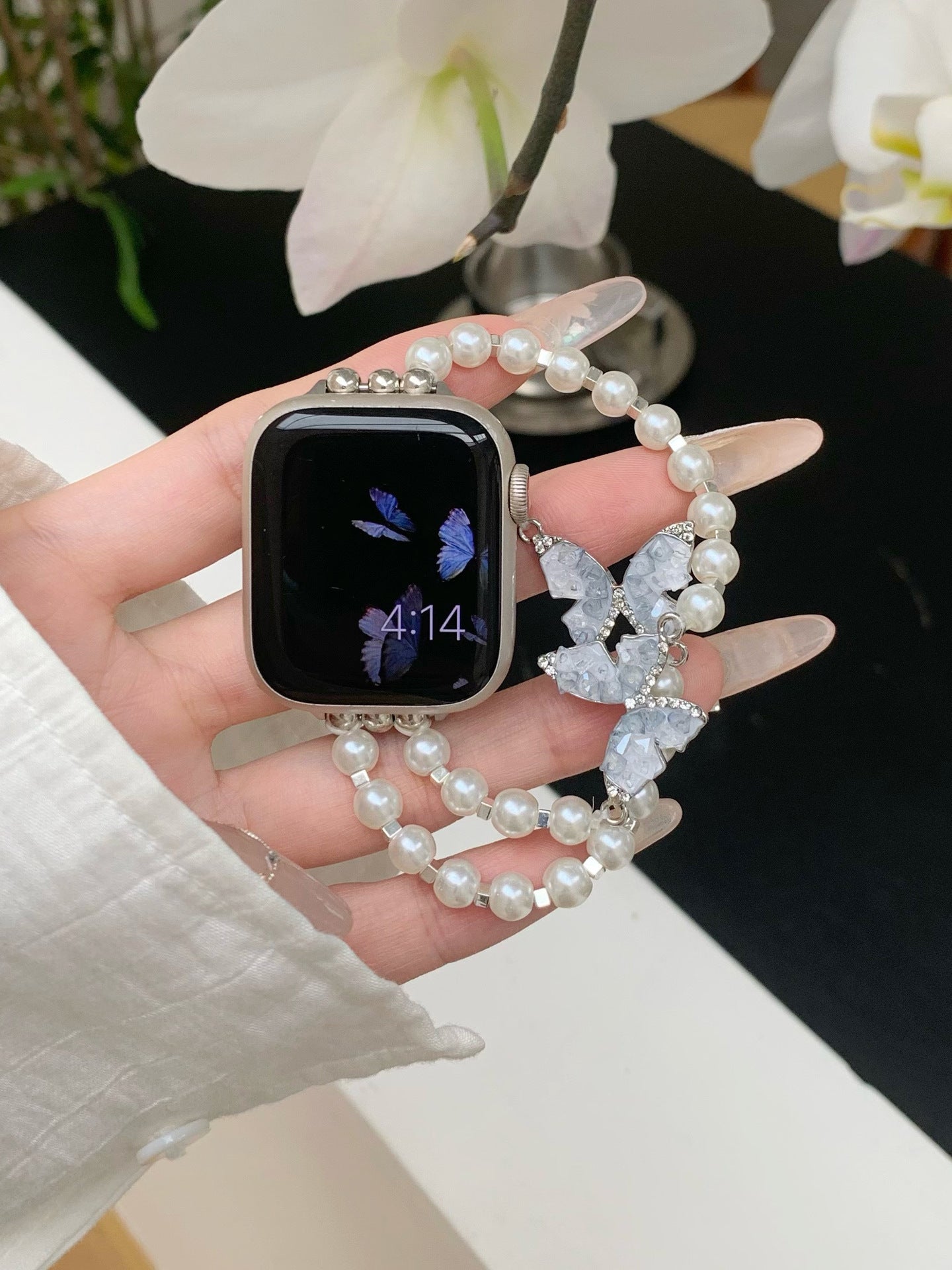 Bracelet Apple Watch avec chaîne papillon en cristal